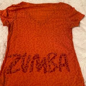 Med orange sheer zumba v neck ❤️❤️